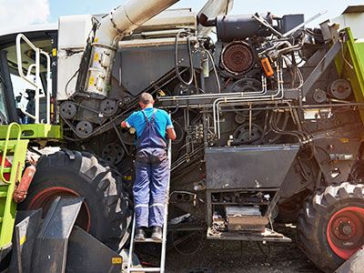 recruitment image of employee working on mining vehicle